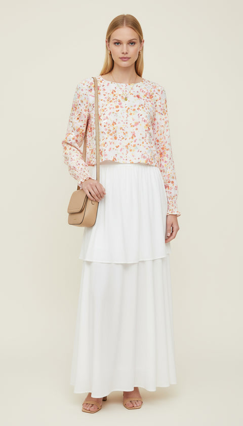 İki katlı üst katı minik renkli çiçekli uzun kol kolları lastikli bluz